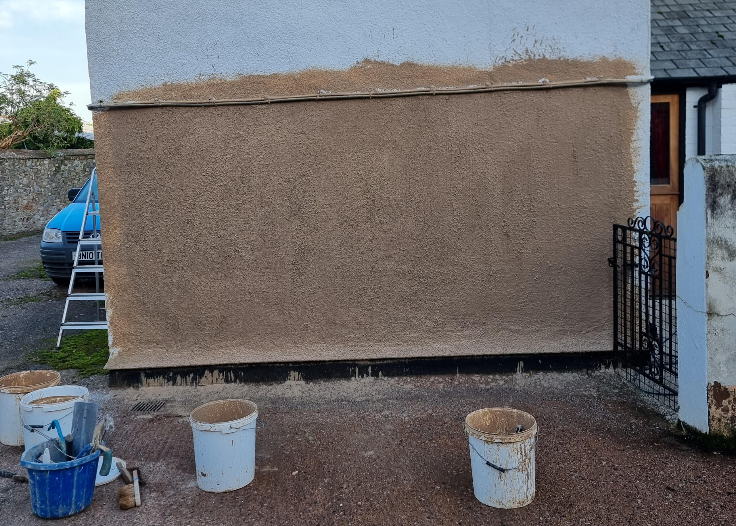 Hand thrown topcoat - roughcast