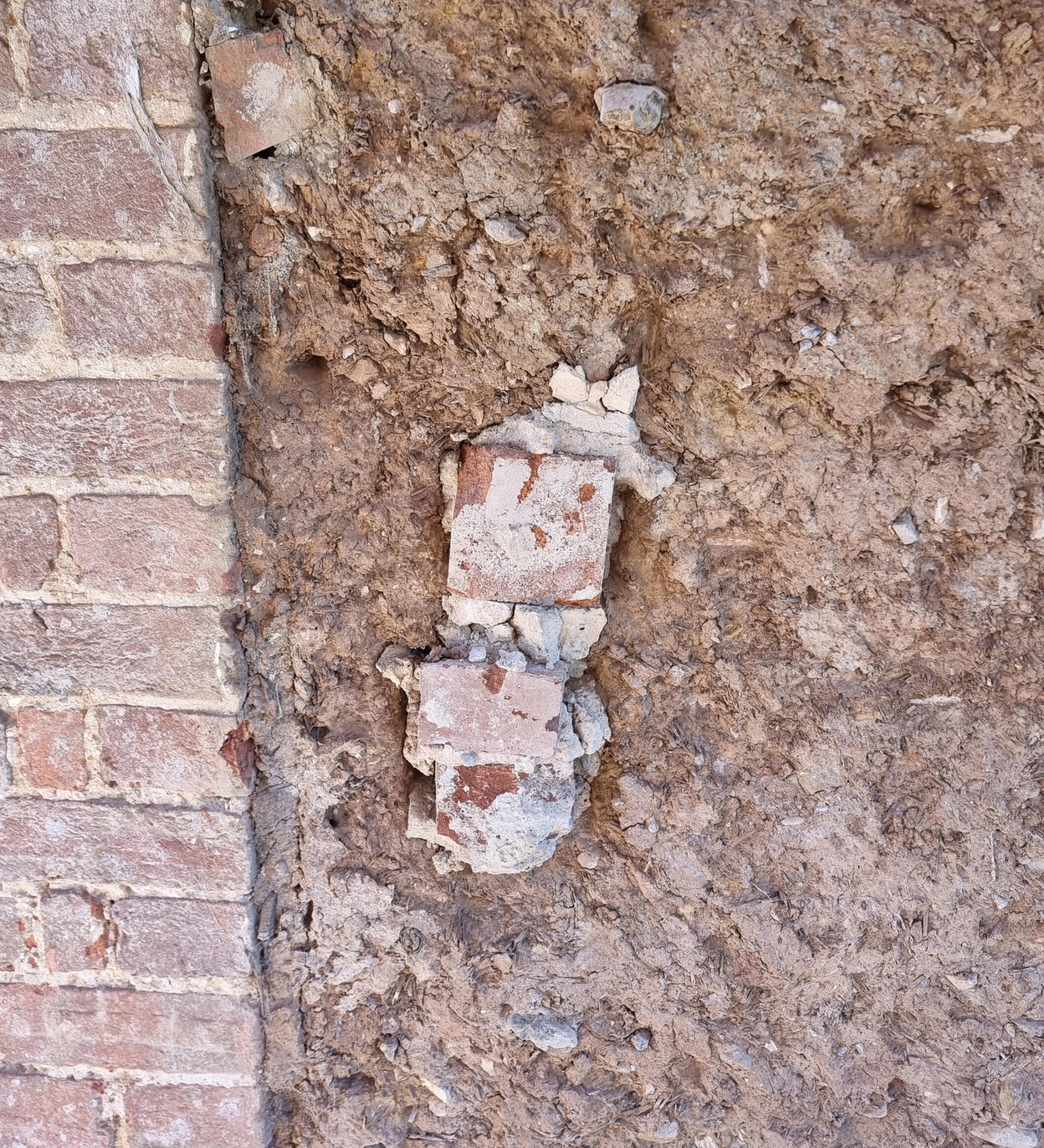Failed brick repair - right flank.