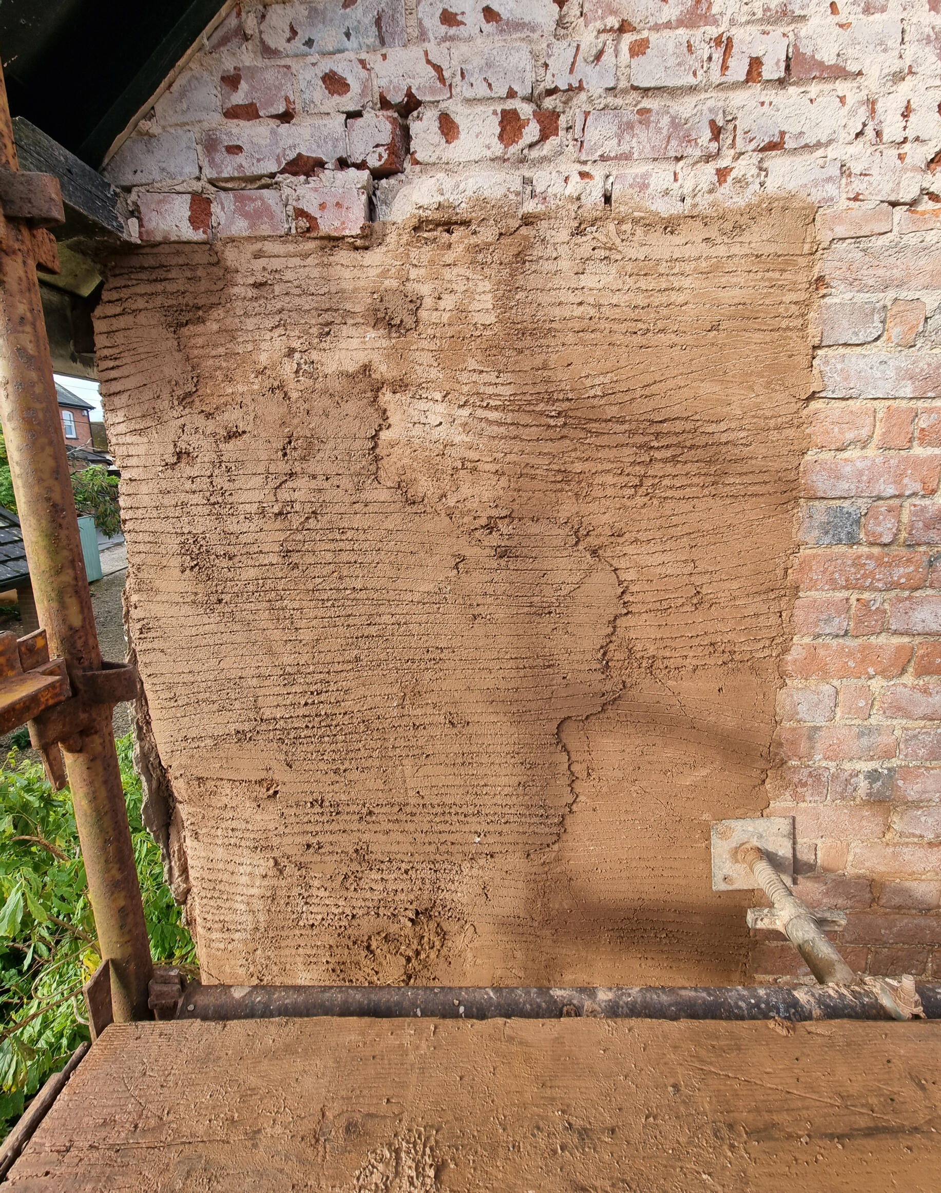 Bringing up to level with multiple layers of mortar.